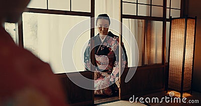 Woman, Japanese and tea ceremony for healing practice or respect for ritual, wellness or tatami room. Female person Stock Photo