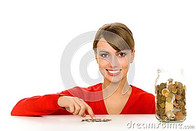 Woman with jar of coins Stock Photo