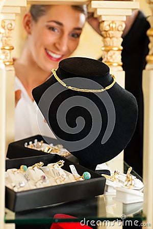 Woman at the jeweller Stock Photo