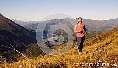 Woman Jogging Beautiful Mountain Scenic Concept Stock Photo