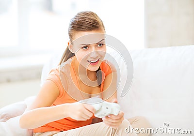 Woman with joystick playing video games Stock Photo