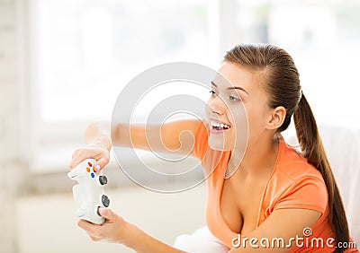 Woman with joystick playing video games Stock Photo