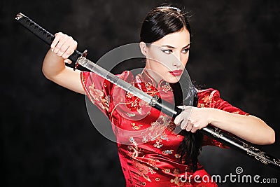 Woman and katana/sword Stock Photo