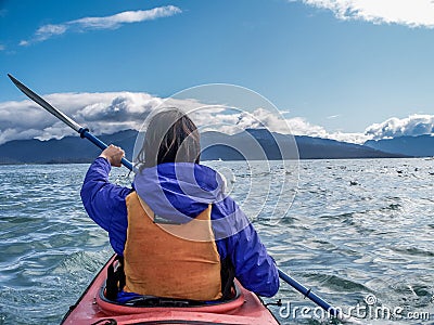 Woman in kayak Stock Photo