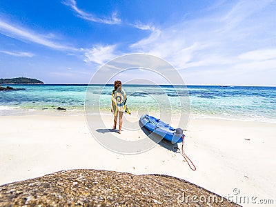 woman with a kayak on an beach in Andaman sea, Koh Lipe - solo travel Stock Photo