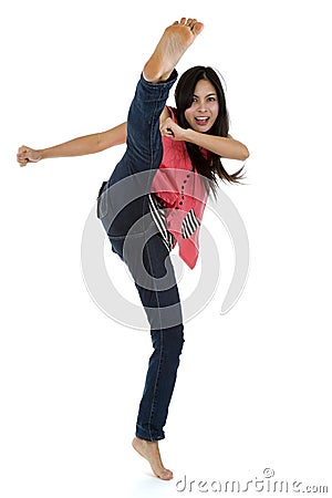 Woman kicking Stock Photo