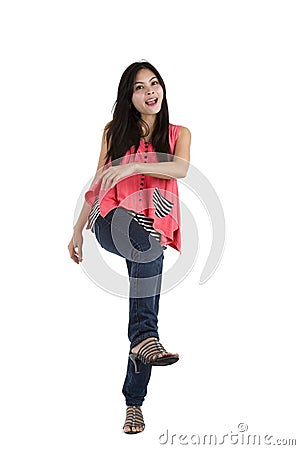 Woman kicking Stock Photo