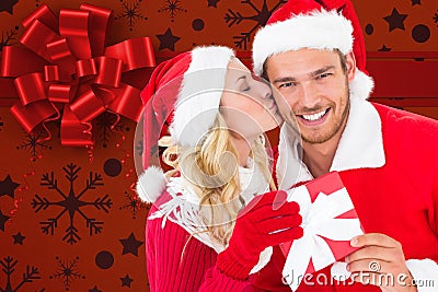 Woman kissing man on cheeks against digitally generated background Stock Photo