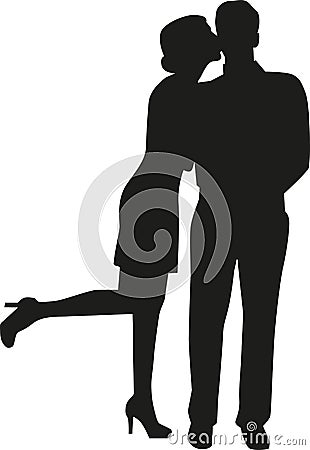 Woman kissing man silhouette Stock Photo