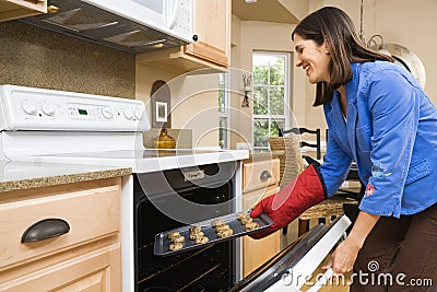 Woman in kitchen. Stock Photo
