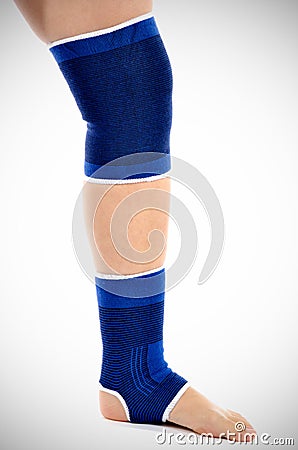 Woman with knee brace Stock Photo