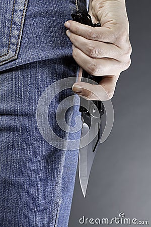 A woman with a knife Stock Photo