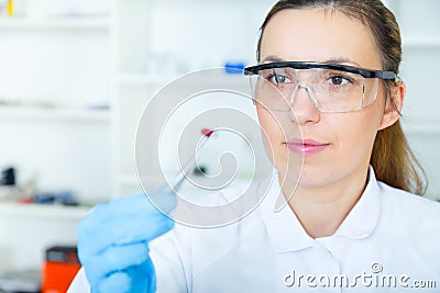 Woman laboratory assistant in the laboratory of food quality Stock Photo