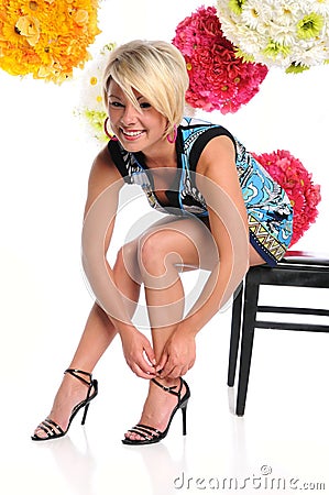 Woman Lacing Her Shoes Stock Photo