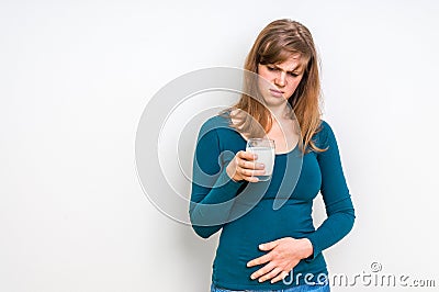 Woman with lactose problem is suffering from stomach pain Stock Photo