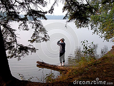 Woman beside lake Stock Photo