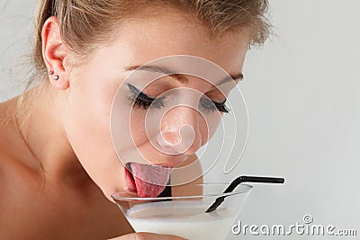 Woman lapping milk Stock Photo