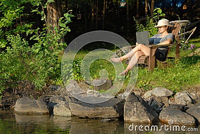 Woman with laptop Stock Photo