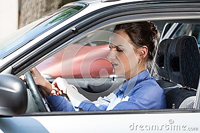 Woman late for work Stock Photo