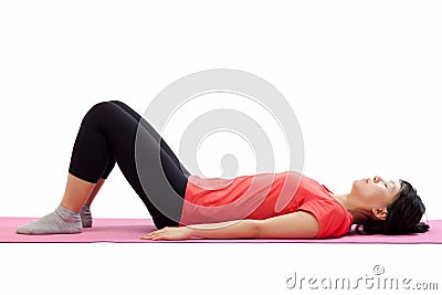 Woman laying down for exercising Stock Photo