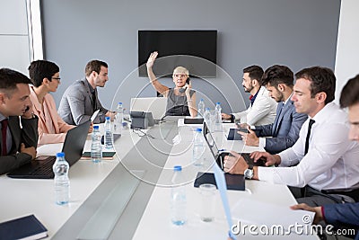 A woman leader on the phone solves the problem Stock Photo