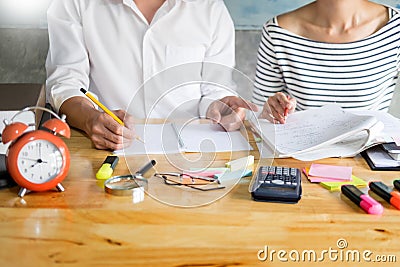 Woman learn and teach tutor concept education helping each other sitting in a table at class room Stock Photo