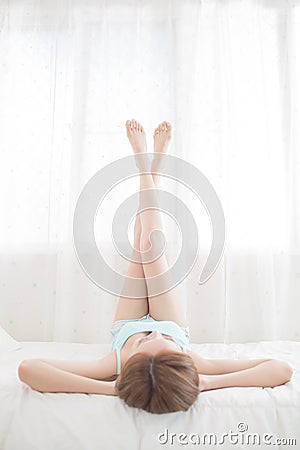 Woman with leg Stock Photo