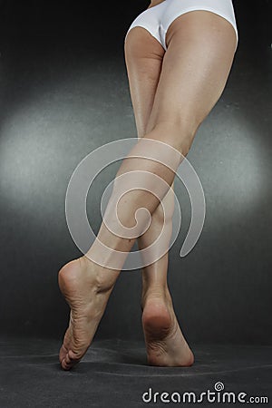 Woman legs and feet wearing underwear Stock Photo