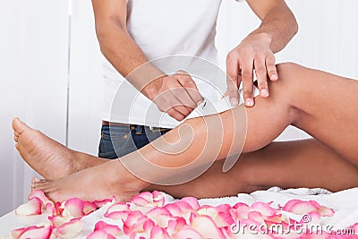 Woman legs waxed Stock Photo