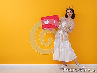 Woman with like icon Stock Photo