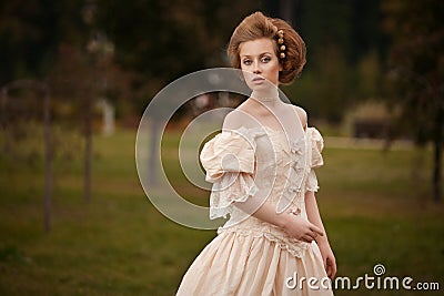 A woman like a princess in an vintage dress Stock Photo