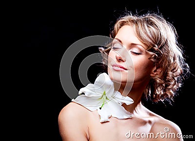 Woman with a lily Stock Photo