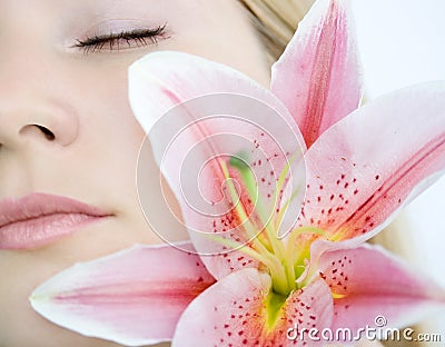 Woman with lily flower Stock Photo