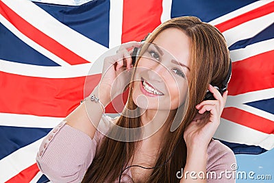 Woman listening english language audiobook Stock Photo