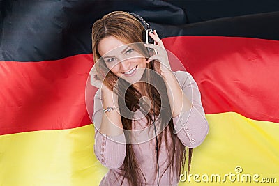 Woman listening german learning audiobook Stock Photo