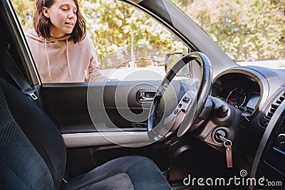 woman locked car and forget keys inside Stock Photo
