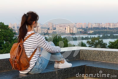 The woman look at the city panorama Stock Photo