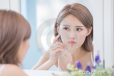 Woman with acne problem Stock Photo