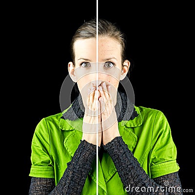 Woman looking horrified at the signs of ageing Stock Photo