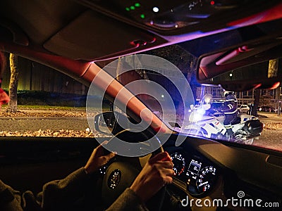 Woman looking at police officer and Foodora food delivery cyclist Editorial Stock Photo