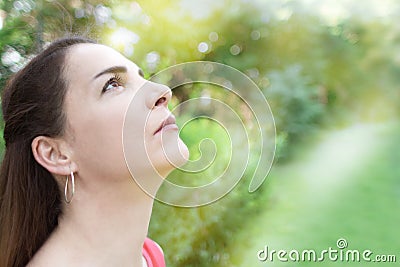 Woman looking the sky, wishing. Stock Photo