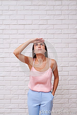 A woman looking up, having an eager eyes Stock Photo