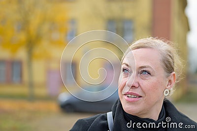 Woman looking up with intrigued expression and parted lips Stock Photo