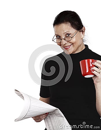 Woman looks at newspaper Stock Photo