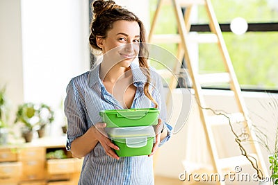 Woman with lunch boxes Stock Photo