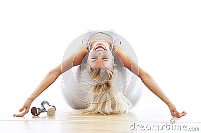 Woman lying on fitness ball Stock Photo