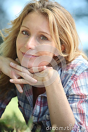 Woman lying on the grass Stock Photo