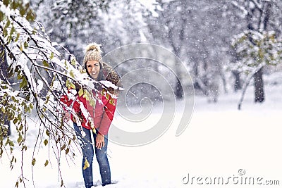 Woman in magic winter day.Young woman enjoying the snowy day Stock Photo