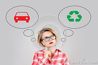 Woman make choice: environmental pollution or environment protection. Stock Photo