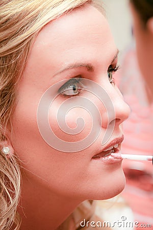 Woman: Makeup Being Applied Stock Photo